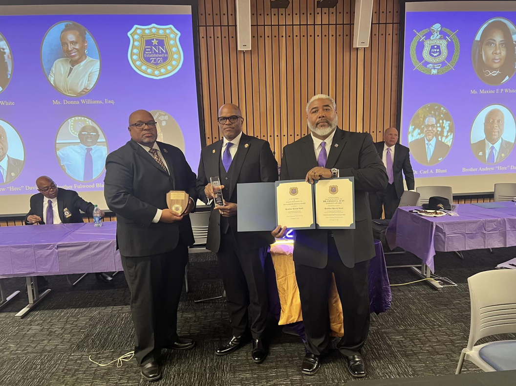 Xi Nu Nu brothers receiving chapter recognition